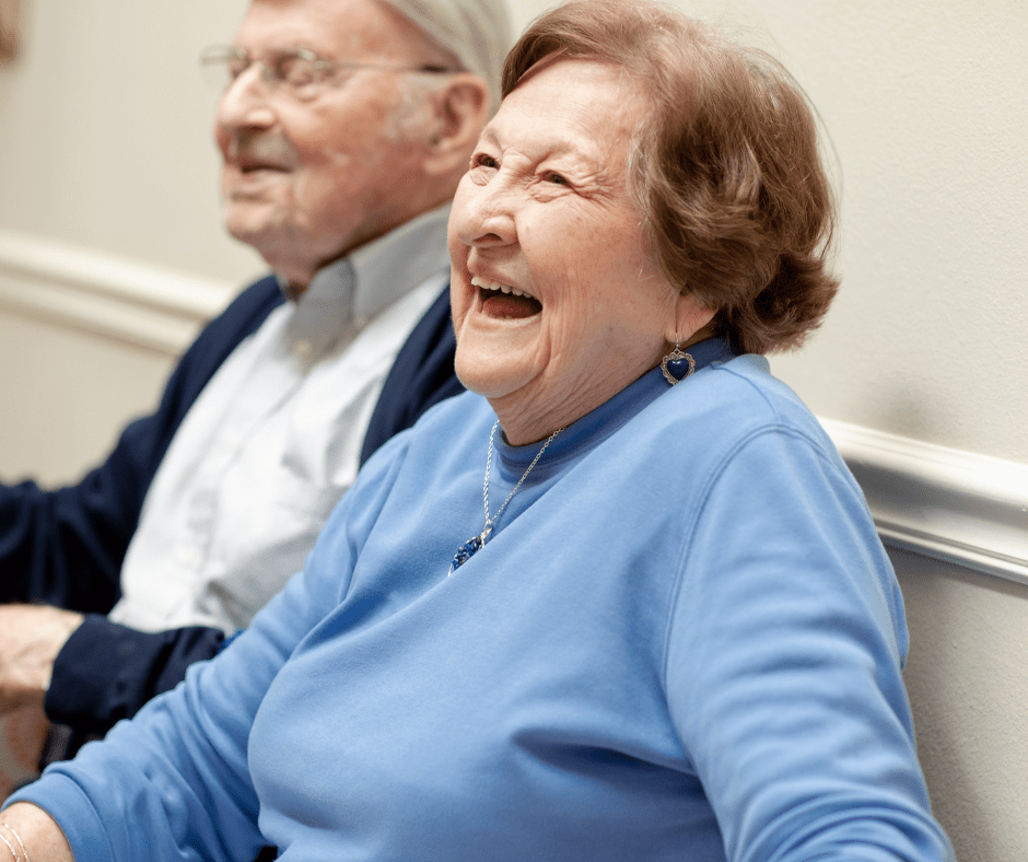 Elderly couple laughing