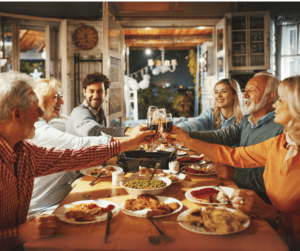 Family cheering over a meal