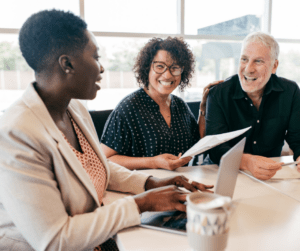 Group of three people having a meeting.